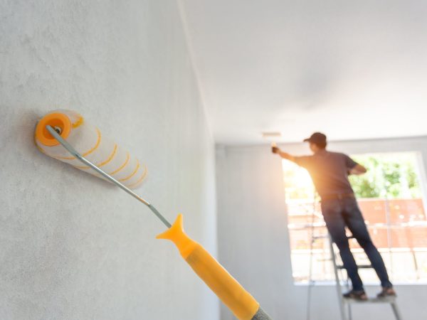 interior-painting-roller-worker-background-home-remodeling-concept-min